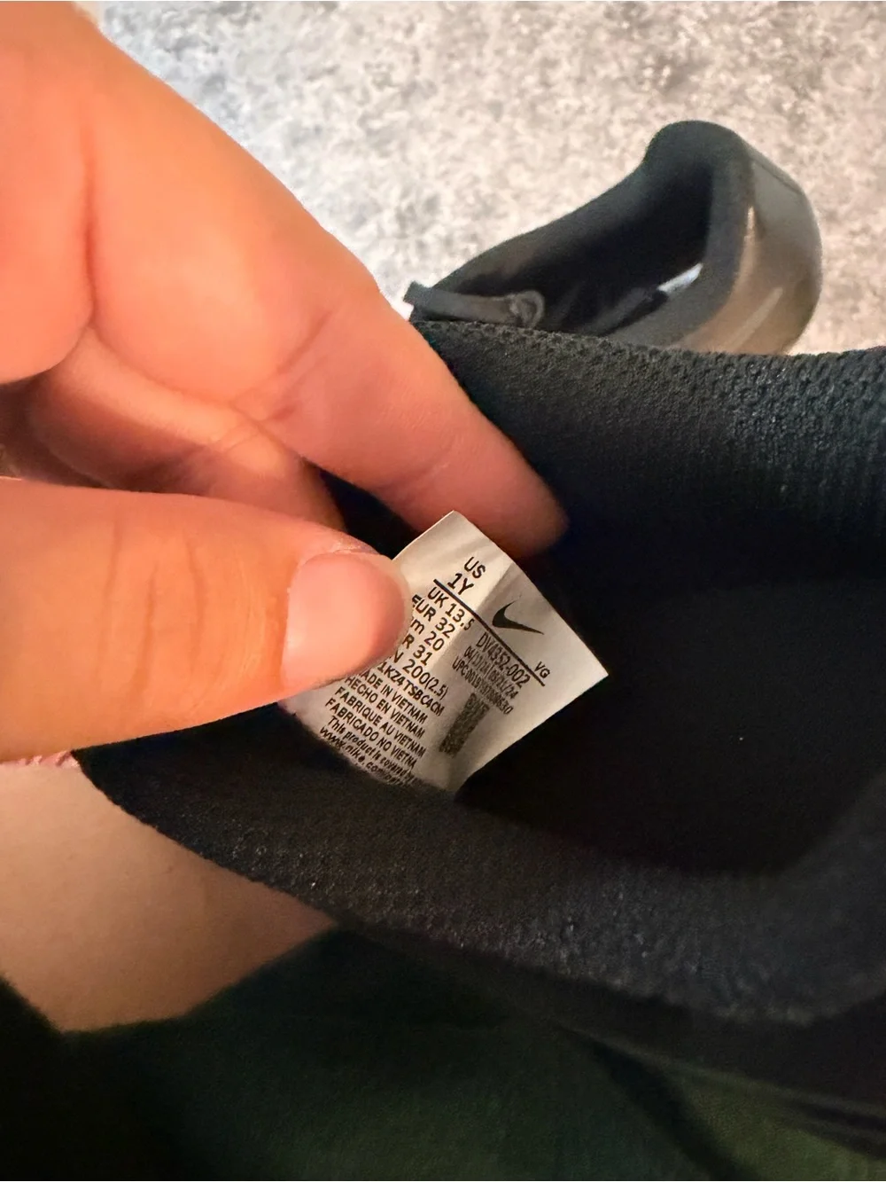 Nike Kids Black Soccer Cleats with Subtle Dark Swoosh